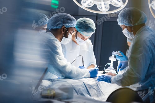 Preview: Medical Professionals Performing Surgery Under Bright Lights