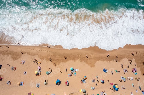 Preview: Aerial view of bustling beach with colorful umbrellas and people enjoying sun on summer day