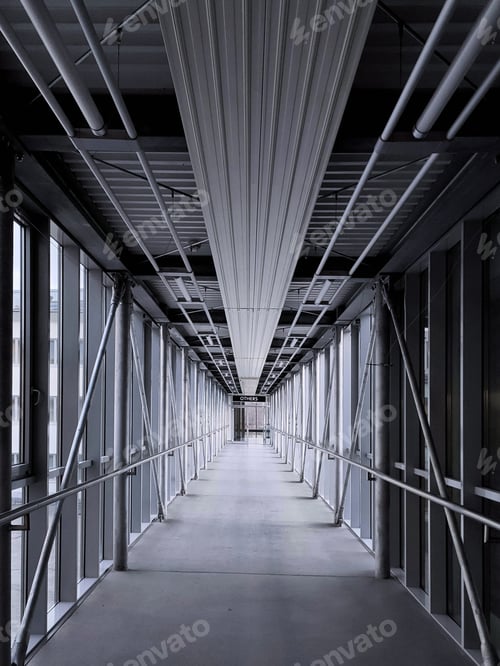 Preview: a pedestrian crossing in a modern building made of a concrete floor and a glazed transparent metal s