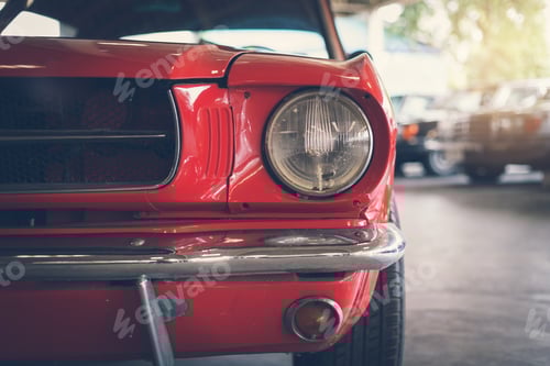 Preview: Close up headlight of red Retro classic car