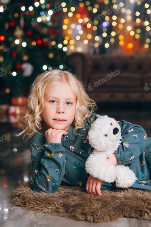 Preview: Cute Little Blonde Girl Posing At The Christmas Tree. Happy New Year Concept. Toning.