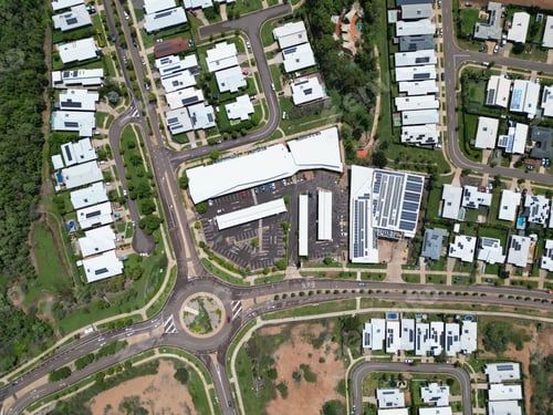 Preview: Aerial View of a residential area with streets and houses with white roofs