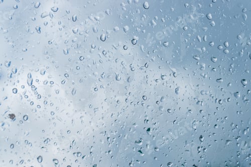 Preview: Rain drops water on glass window background
