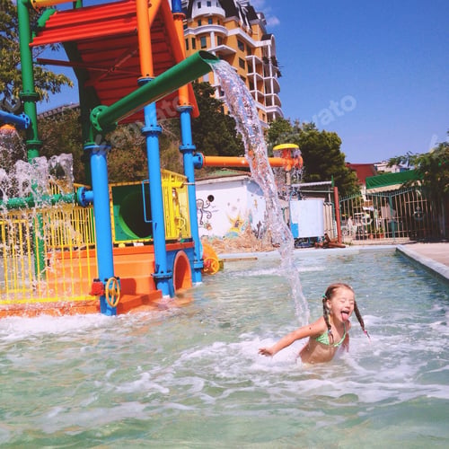 Preview: Little girl having fun in the water park