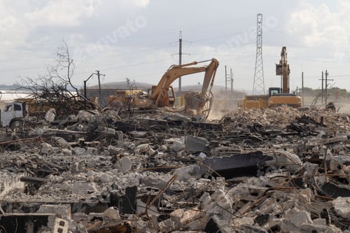 Preview: Excavator loading rubble into a dump truck