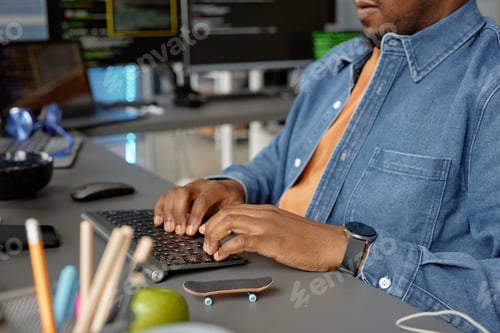 Preview: Programmer Typing Source Codes in IT Development Company