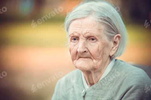 Preview: Portrait of pensive senior woman