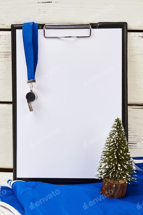 Preview: Coach's clipboard and whistle