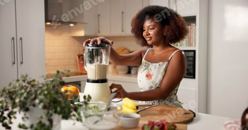 Preview: Woman, blender and healthy smoothie at house for nutrition drink, detox benefits and weight loss pr