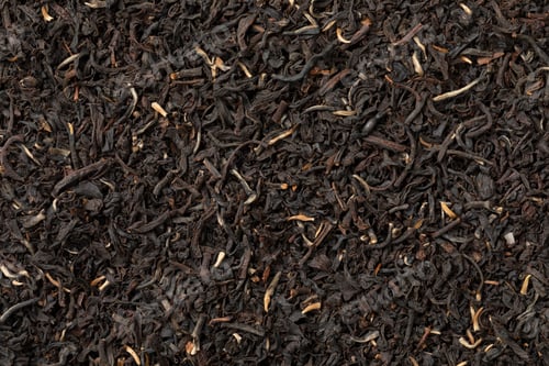 Preview: Golden Garden Estate Ceylon dried Tea leaves close up full frame