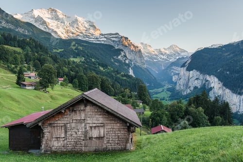 Preview: Wengen mountain village on bernese oberland and Lauterbrunnen valley in the evening at Switzerland