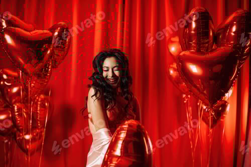 Preview: Portrait of beauty glamour asian sexy smile girl in underwear against shiny red inflatable balloons
