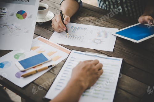 Preview: Business people discussing during a meeting with analysis.