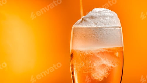 Preview: Lager beer settles in the glass with a white cap of foam