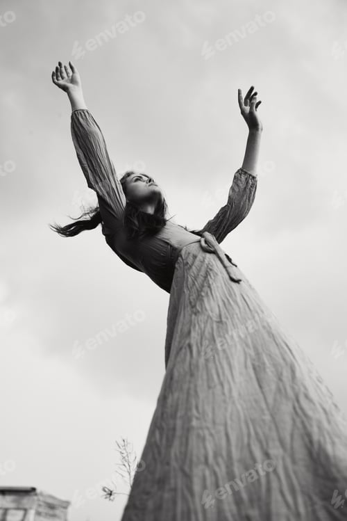 Preview: portrait of a beautiful woman in dress dramatic style emotions posing unaltered
