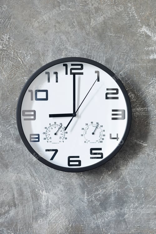 Preview: wall clock at concrete or painted background