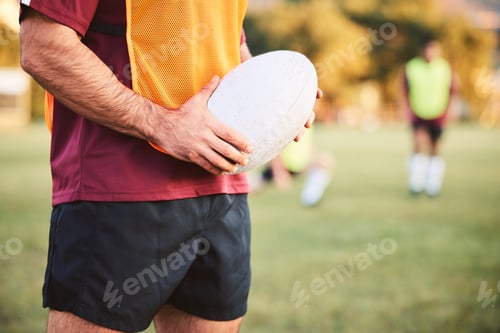 Preview: Rugby, man and hands with ball for sports games, competition and contest on field. Closeup of athle