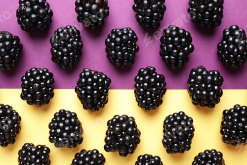 Preview: Tasty ripe blackberries on color background, flat lay