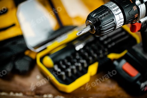 Preview: Working tools. Screwdriver bits. On a wooden background.