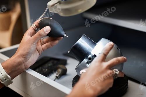 Preview: An artisan focuses on bringing out the brilliance of a jewel using specialized tools and care