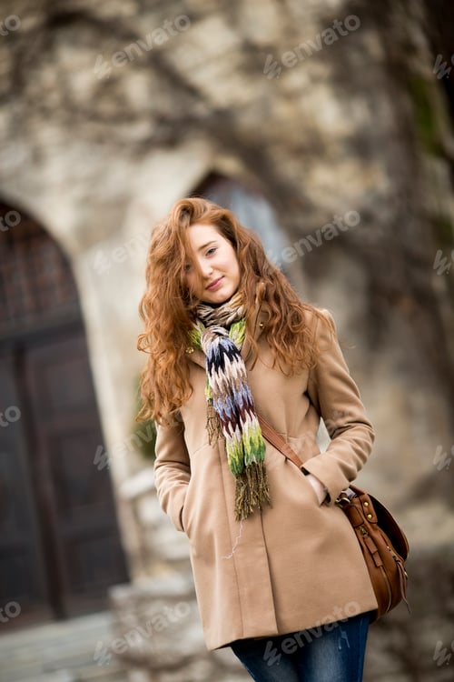 Preview: Young red hair woman at outdoors