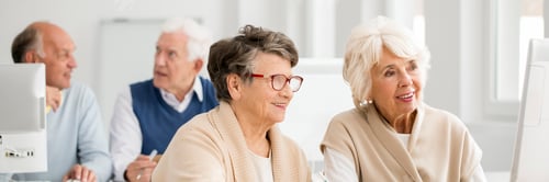 Preview: Two older women using computer