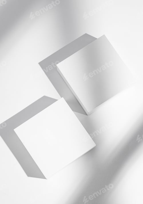 Preview: Two empty cubes, boxes or podium on a white background with soft shadows.