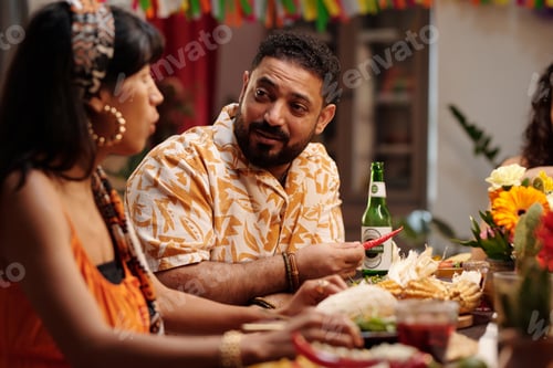 Preview: Man looking at his wife during chat