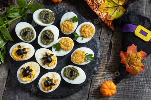 Preview: Halloween funny idea for party food. Halloween creative set stuffed eggs.