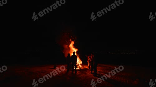 Preview: Friends in darkness around campfire, Naramata, British Columbia, Canada