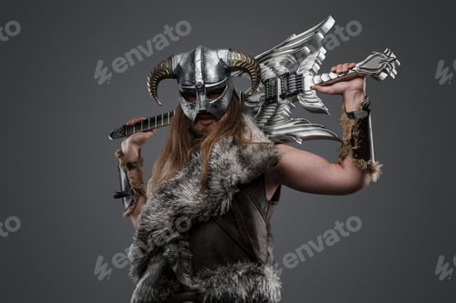 Preview: Determined viking holding electric guitar on his shoulder