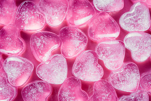 Preview: Valentine card with heart shaped candy on a pink background. Hearts icon pattern.