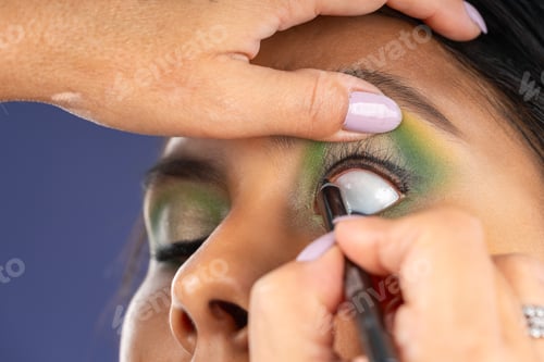 Preview: Eye lining young woman's eye