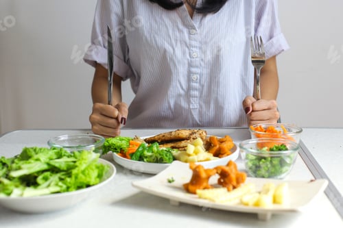 Preview: Hands Holding Spoon And Fork