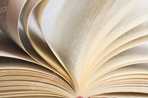 Preview: Closeup view of old open hardcover book