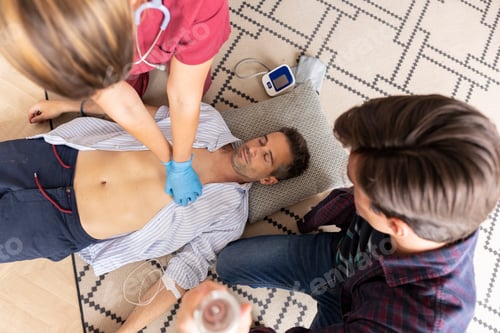 Preview: Emergency help for unconscious man, First aid preparation Emergency CPR for female doctor taking