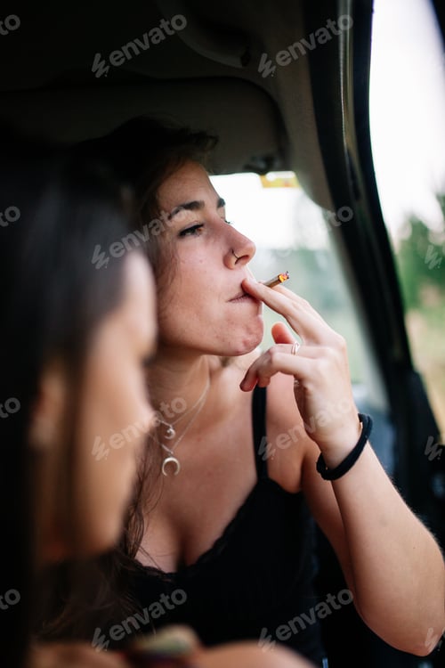 Preview: Two young lesbians smoking inside a car