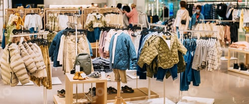 Preview: Children Male Man Casual Clothes And Children Clothes On Shelves And Hanger In Store Of Shopping