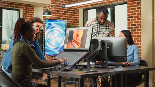 Preview: Multiethnic coworkers analyzing graphic developing technology