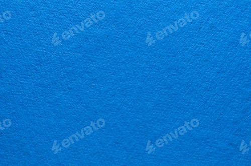 Preview: Rough texture of blue paper with fibers, macro photography. Close-up paper background top view