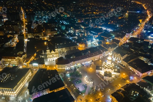 Preview: Aerial view of bright illuminated streets and buildings in Ukrainian Ivano-Frankivsk city center at