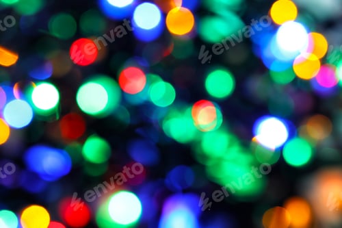 Preview: Blurred view of beautiful Christmas lights. Festive background