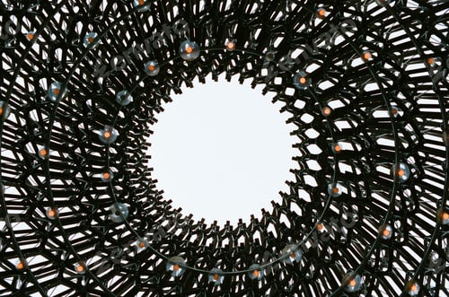 Preview: Low angle shot of lamps in metal circle