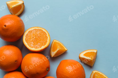 Preview: Fresh oranges on the blue background