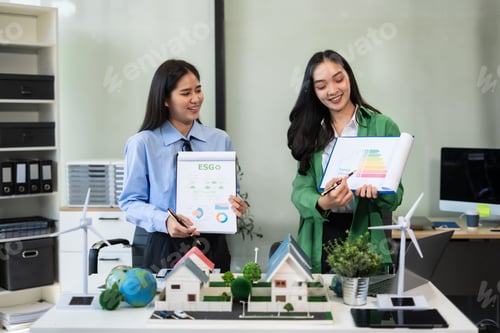 Preview: Businessman team brainstorming using computer on CO2 emission reduction concept.