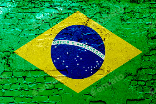Preview: a graffiti of national flag of brazil painted on the rusty wall