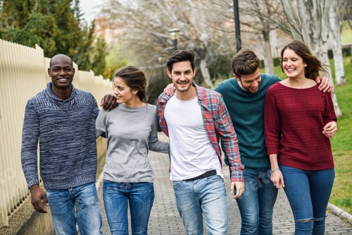 Preview: Group of friends having fun together outdoors