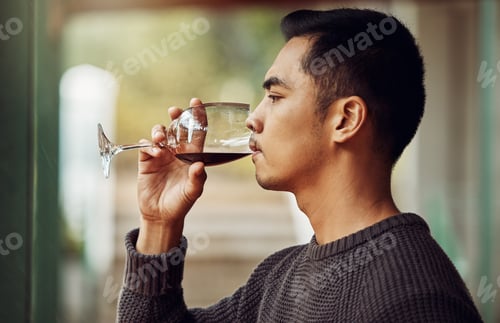 Preview: Now this is a good wine. Shot of a young man out wine tasting.