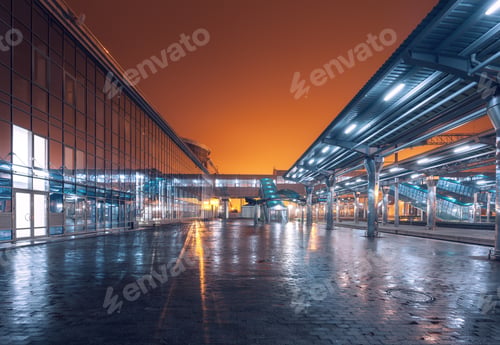 Preview: Railway station at night. Train platform in fog. Railroad