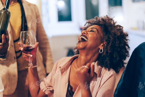 Preview: smiling happy african lady at table